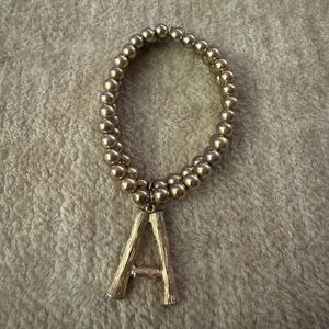 Anthropologie Gold Beaded Bracelet with Letter A Charm